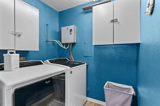 a bathroom with a sink a toilet and vanity