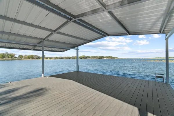 a view of a balcony with an ocean