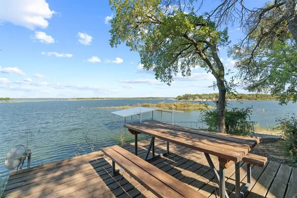 a view of a terrace with lake view and mountain view
