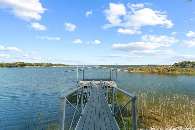 a view of a lake with a outdoor space