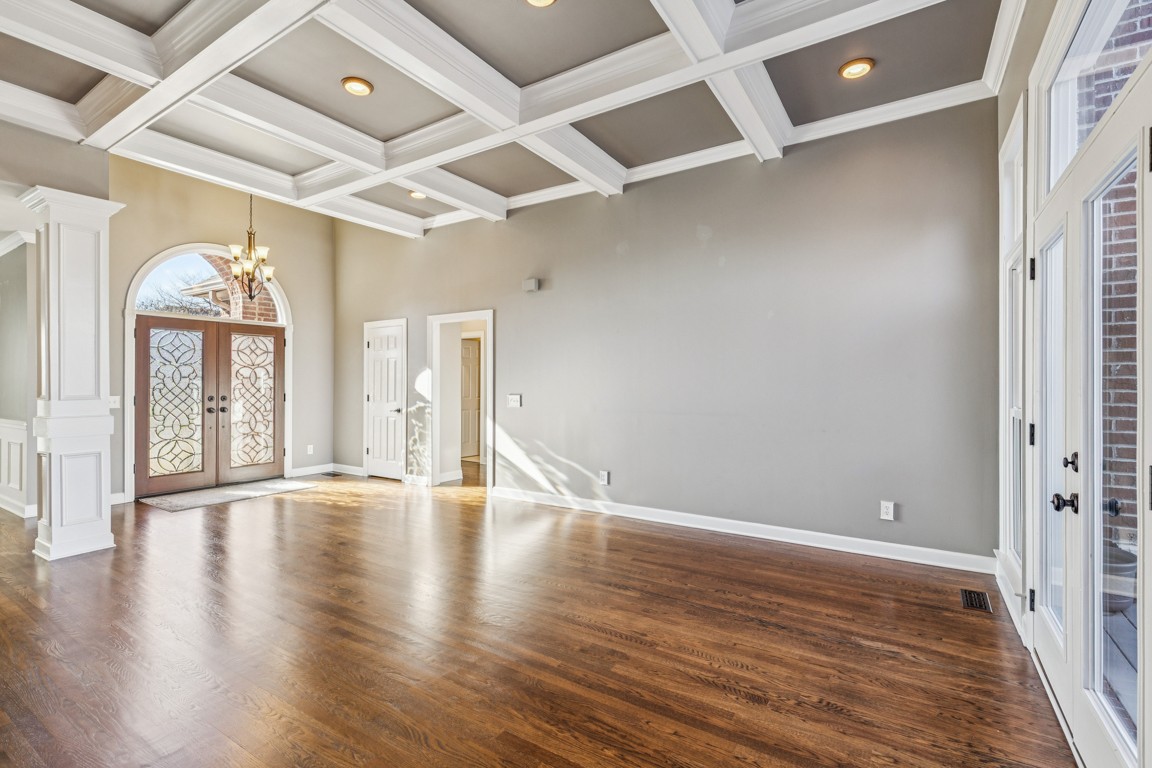 230 Temple Crest Trail Franklin, TN 37069 - Photo 11 of 40 wooden floor in an empty room with a window