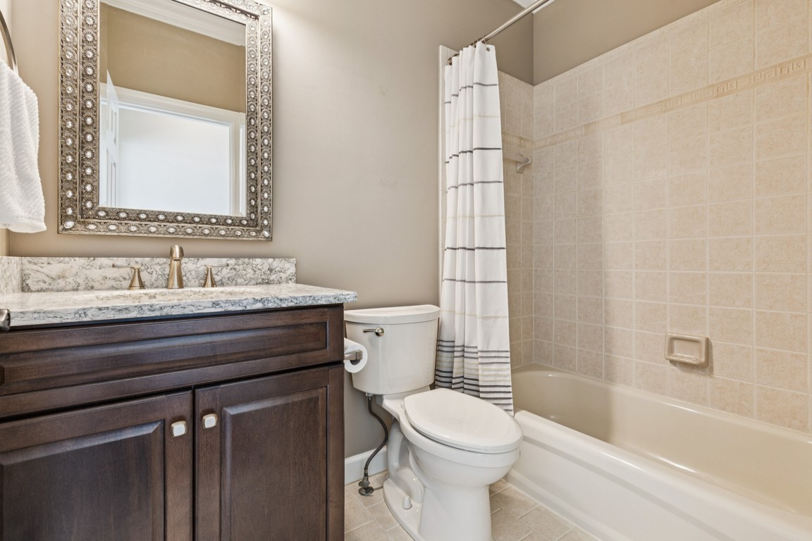230 Temple Crest Trail Franklin, TN 37069 - Photo 19 of 40 a bathroom with a sink a toilet and shower