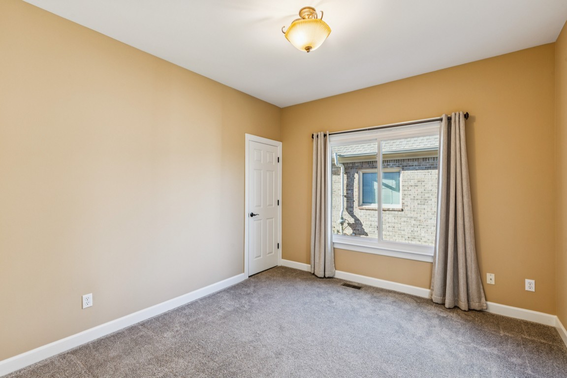 230 Temple Crest Trail Franklin, TN 37069 - Photo 20 of 40 a view of an empty room with a window