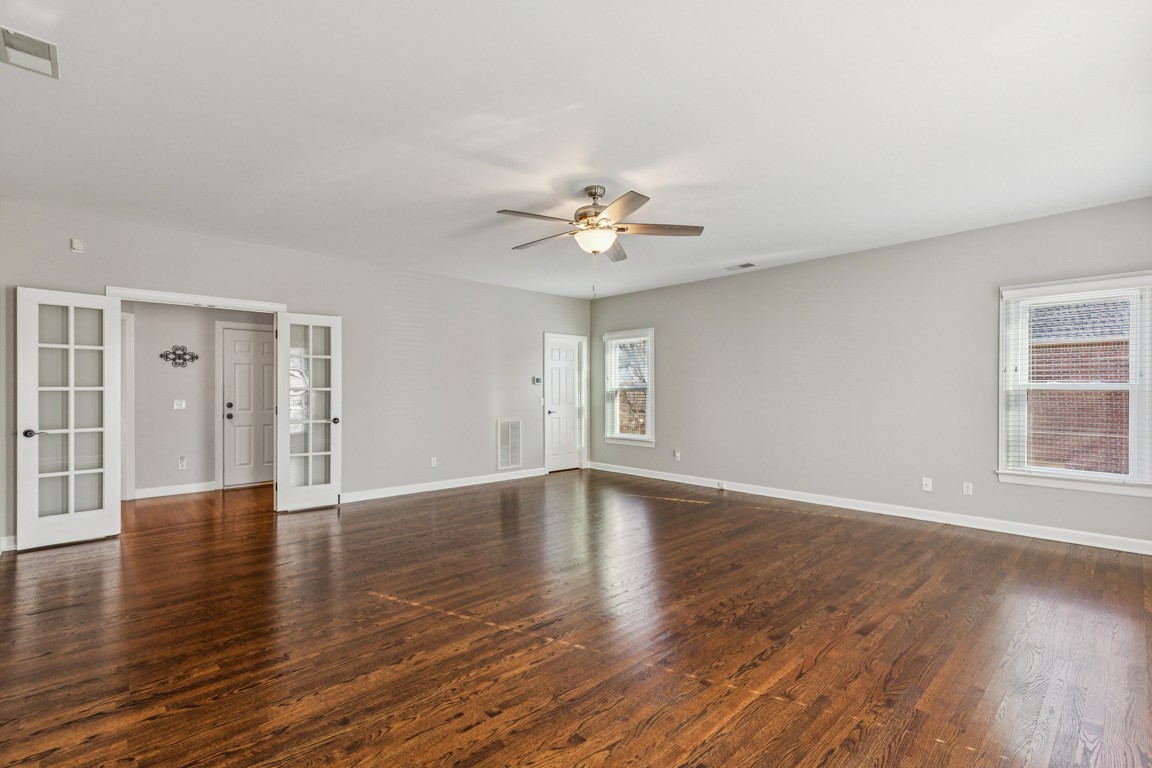 230 Temple Crest Trail Franklin, TN 37069 - Photo 25 of 40 an empty room with wooden floor and window