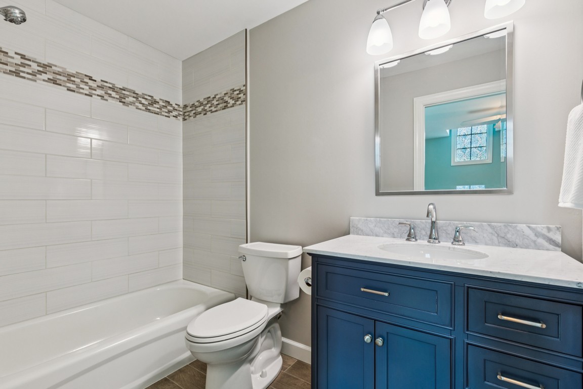 230 Temple Crest Trail Franklin, TN 37069 - Photo 27 of 40 a bathroom with a sink a toilet and shower