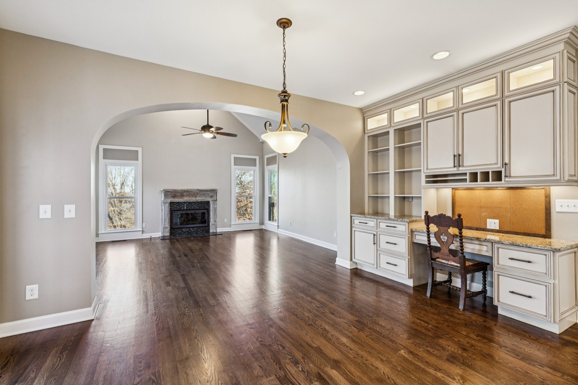 230 Temple Crest Trail Franklin, TN 37069 - Photo 7 of 40 a view of a kitchen with furniture and wooden floor