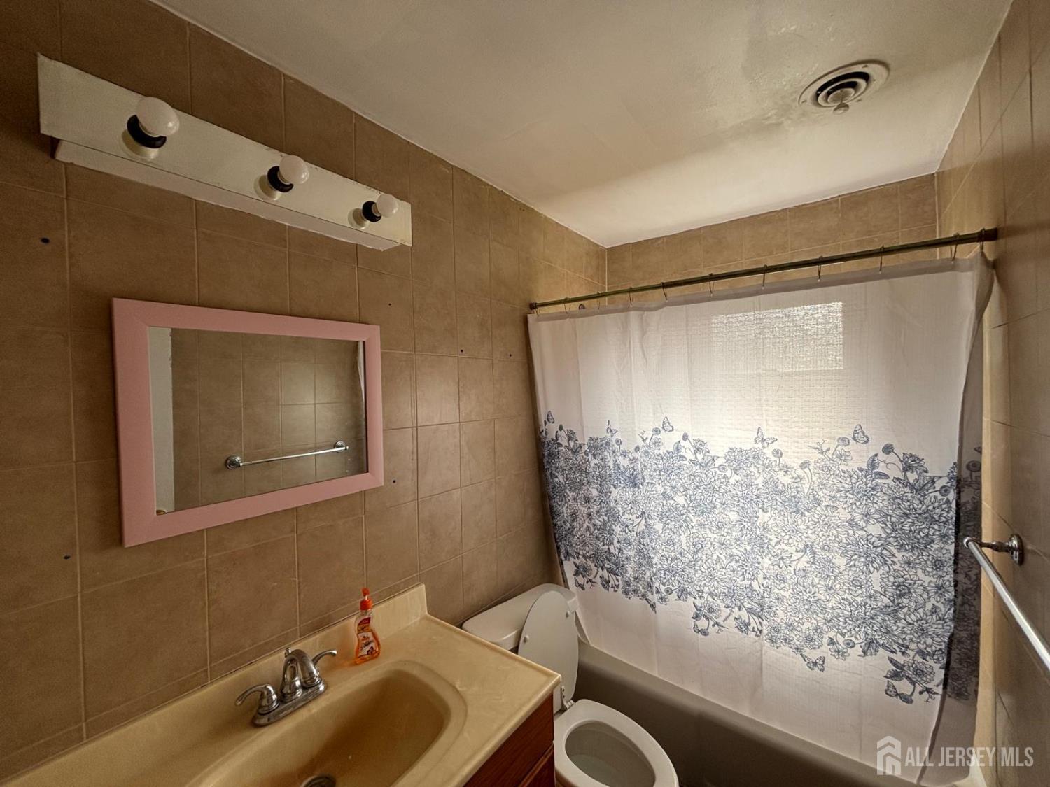30 Judson Street, Unit 8A Edison, NJ 08837 - Photo 7 of 7 a bathroom with a sink toilet and shower