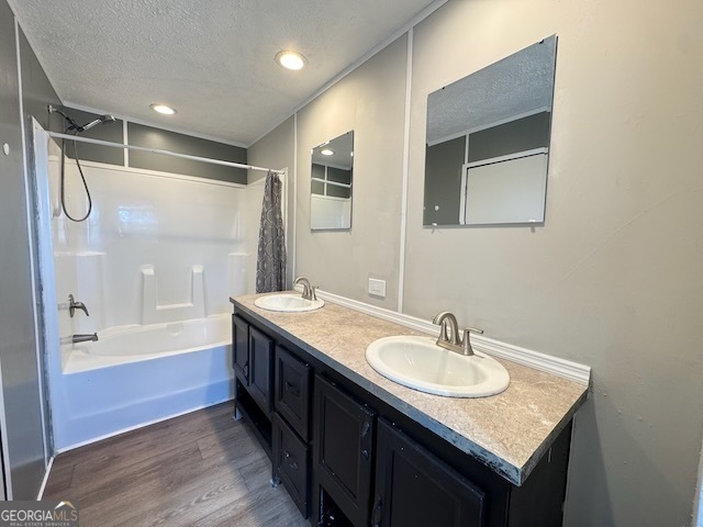 805 Smart Road Alma, GA 31510 - Photo 18 of 41 a bathroom with a granite countertop sink mirror and a bathtub