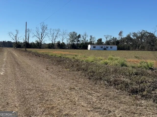 a view of outdoor space and yard