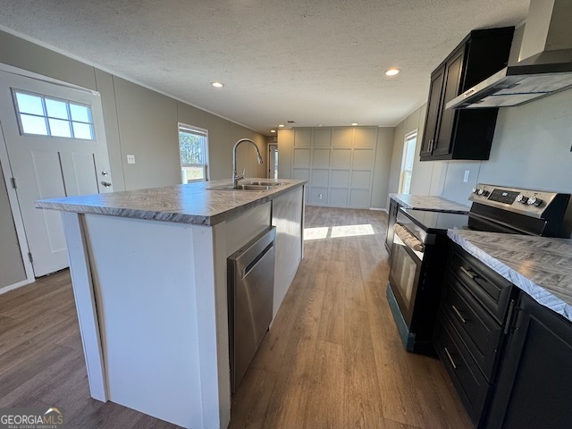 805 Smart Road Alma, GA 31510 - Photo 9 of 41 a kitchen with stainless steel appliances granite countertop a stove a sink and a refrigerator