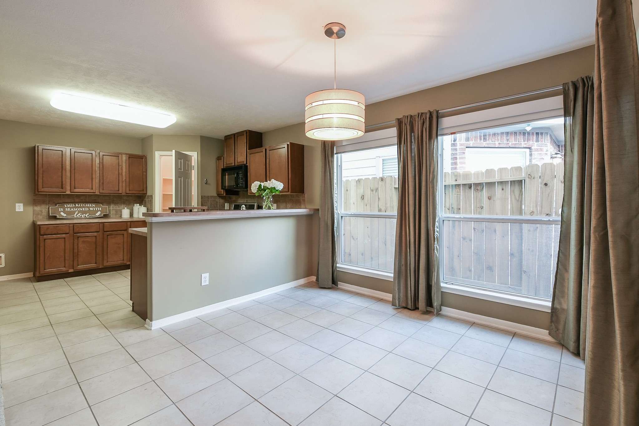 2415 Lacyberry Street Houston, TX 77080 - Photo 12 of 36 a kitchen with stainless steel appliances granite countertop a refrigerator and a sink