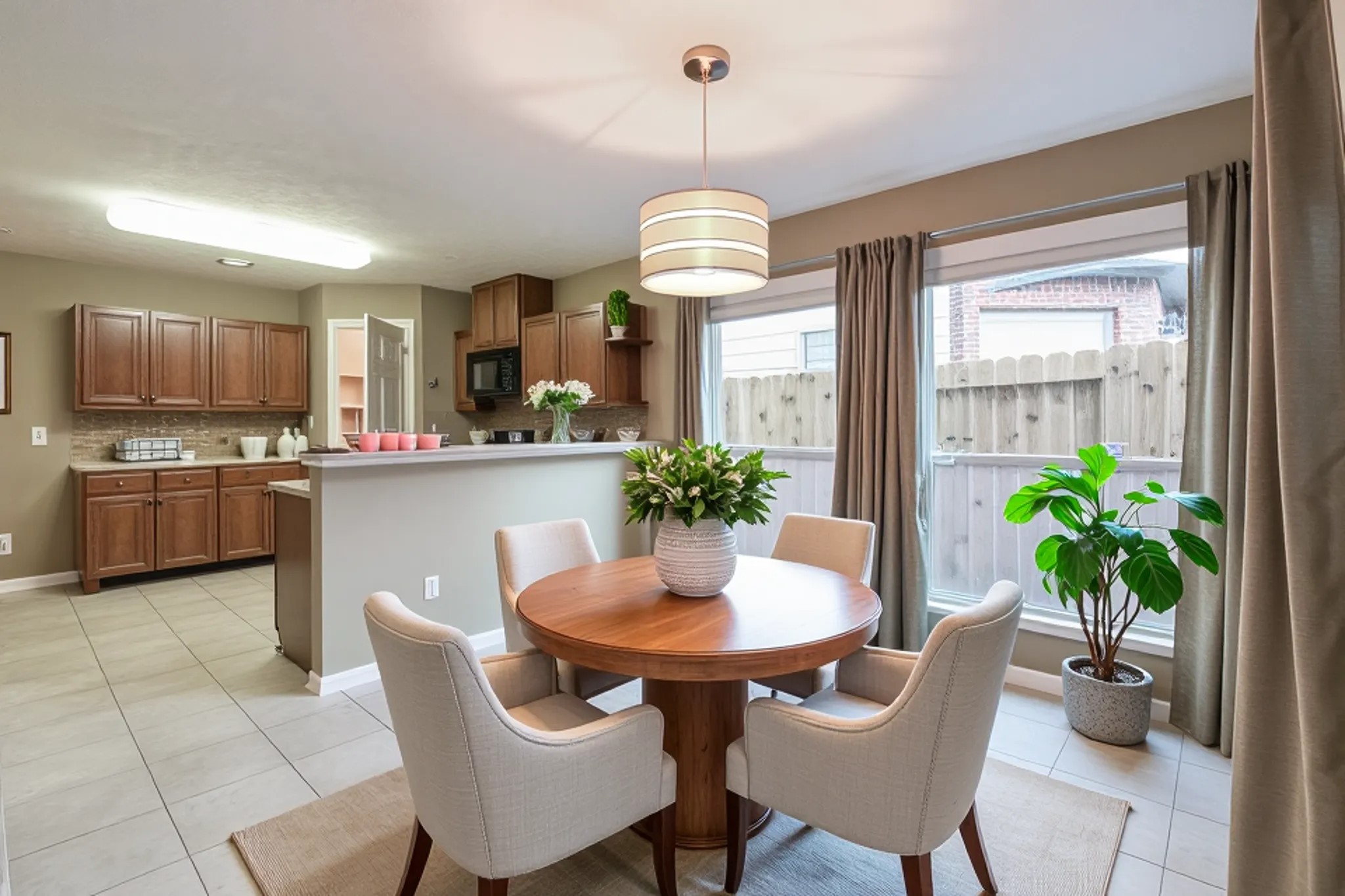 2415 Lacyberry Street Houston, TX 77080 - Photo 13 of 36 a dining room filled chandelier and wooden floor