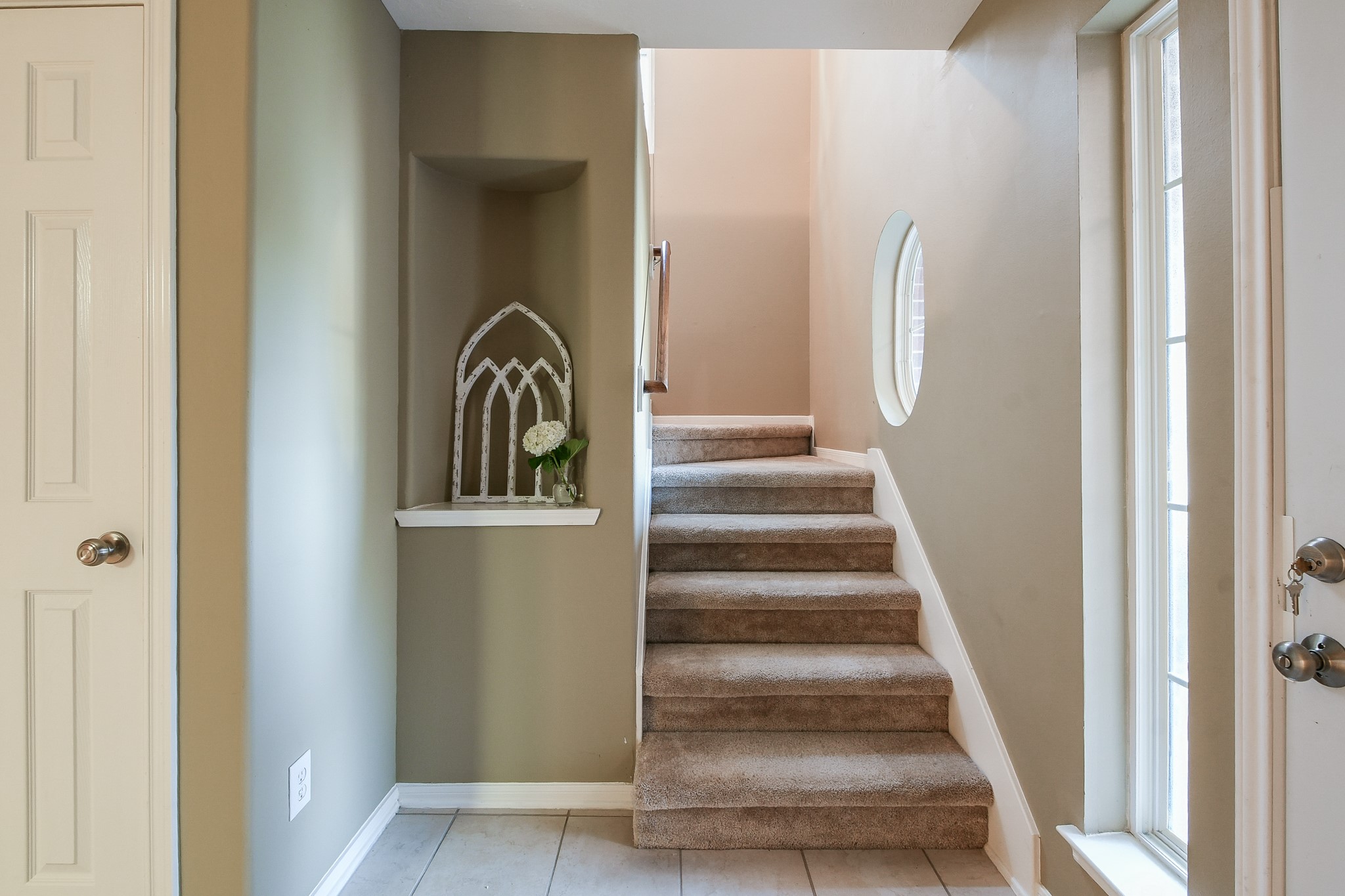2415 Lacyberry Street Houston, TX 77080 - Photo 17 of 36 a view of staircase with white walls and window