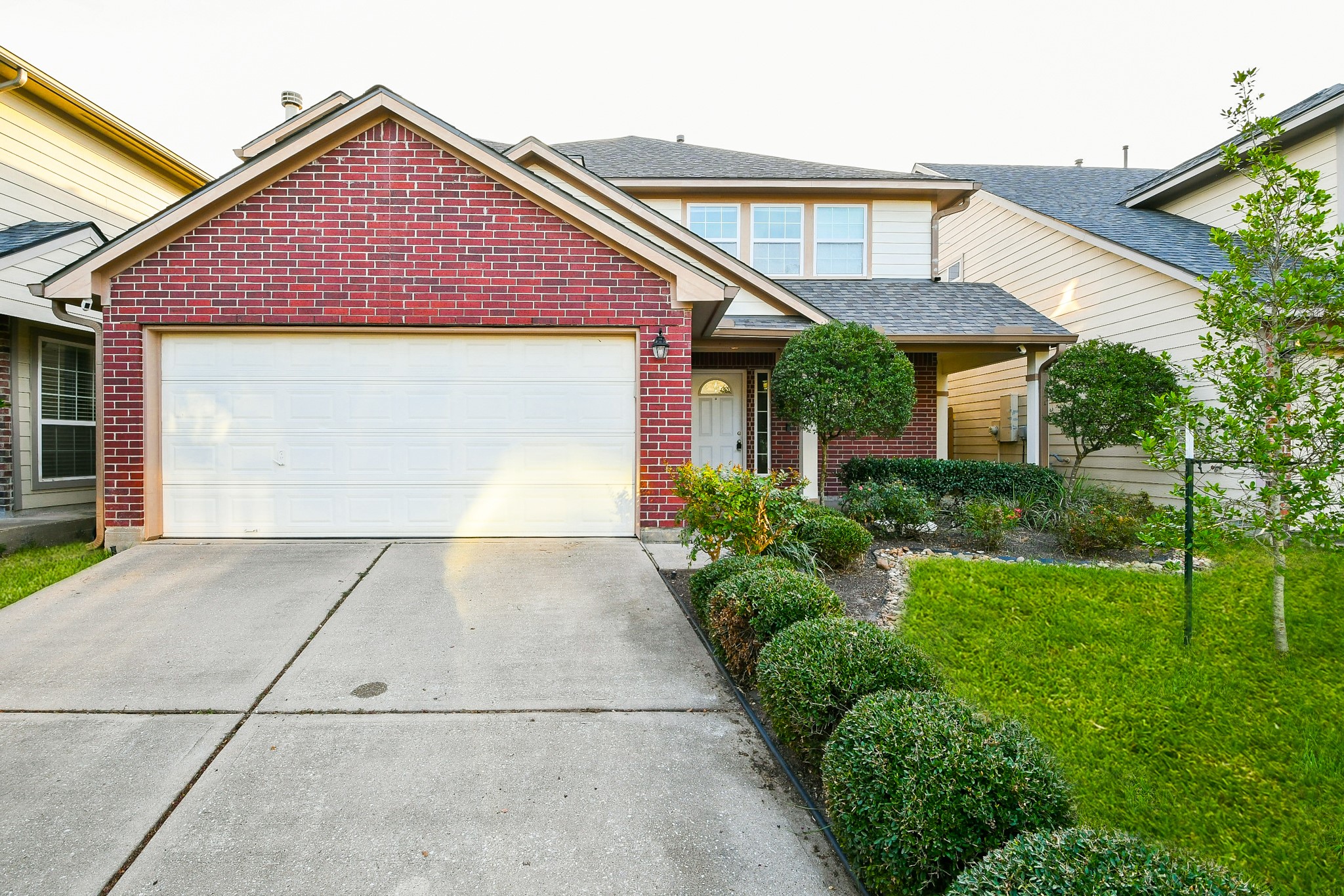 2415 Lacyberry Street Houston, TX 77080 - Photo 2 of 36 a front view of a house with garden