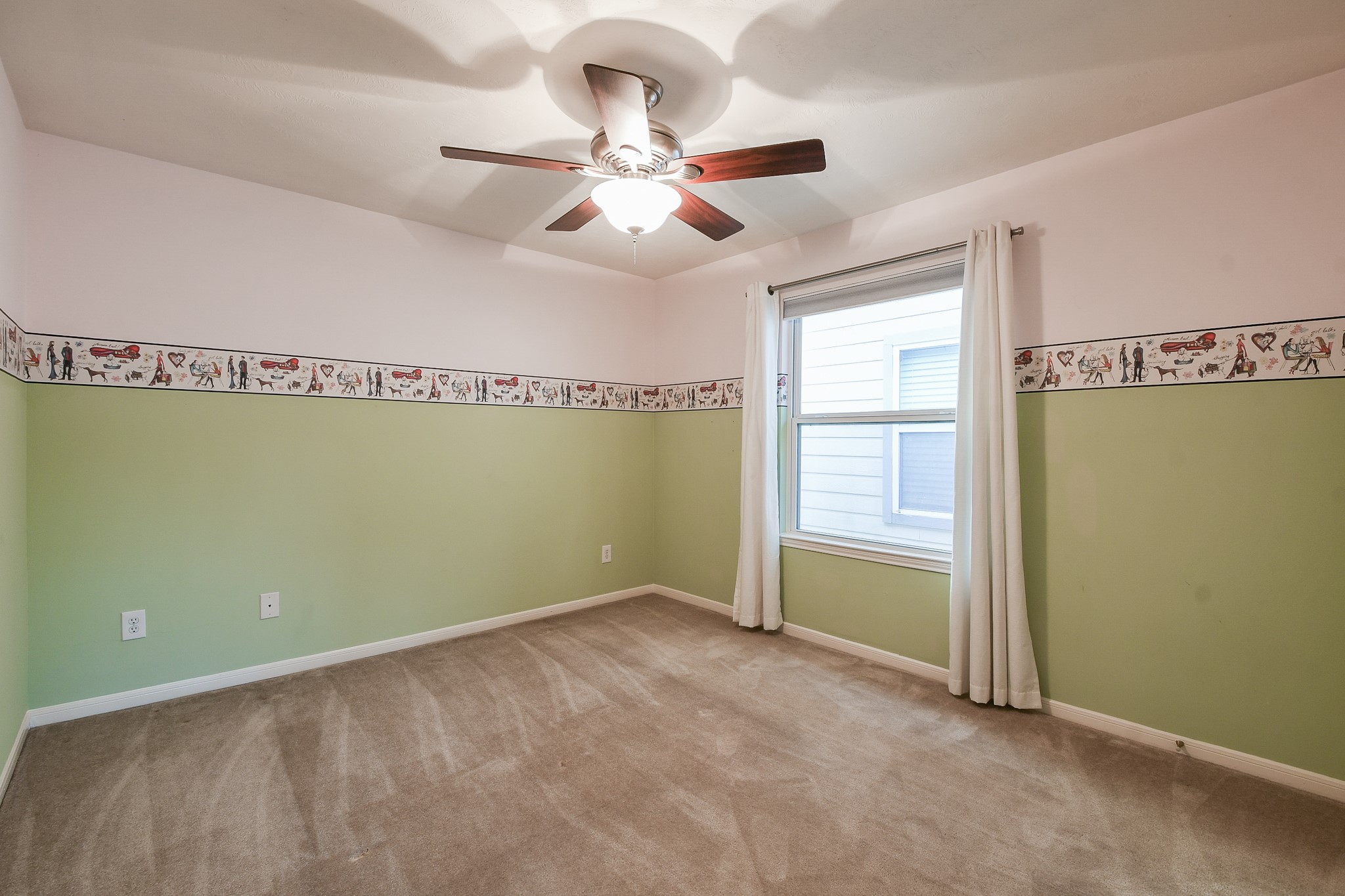 2415 Lacyberry Street Houston, TX 77080 - Photo 27 of 36 a view of a room with a ceiling fan