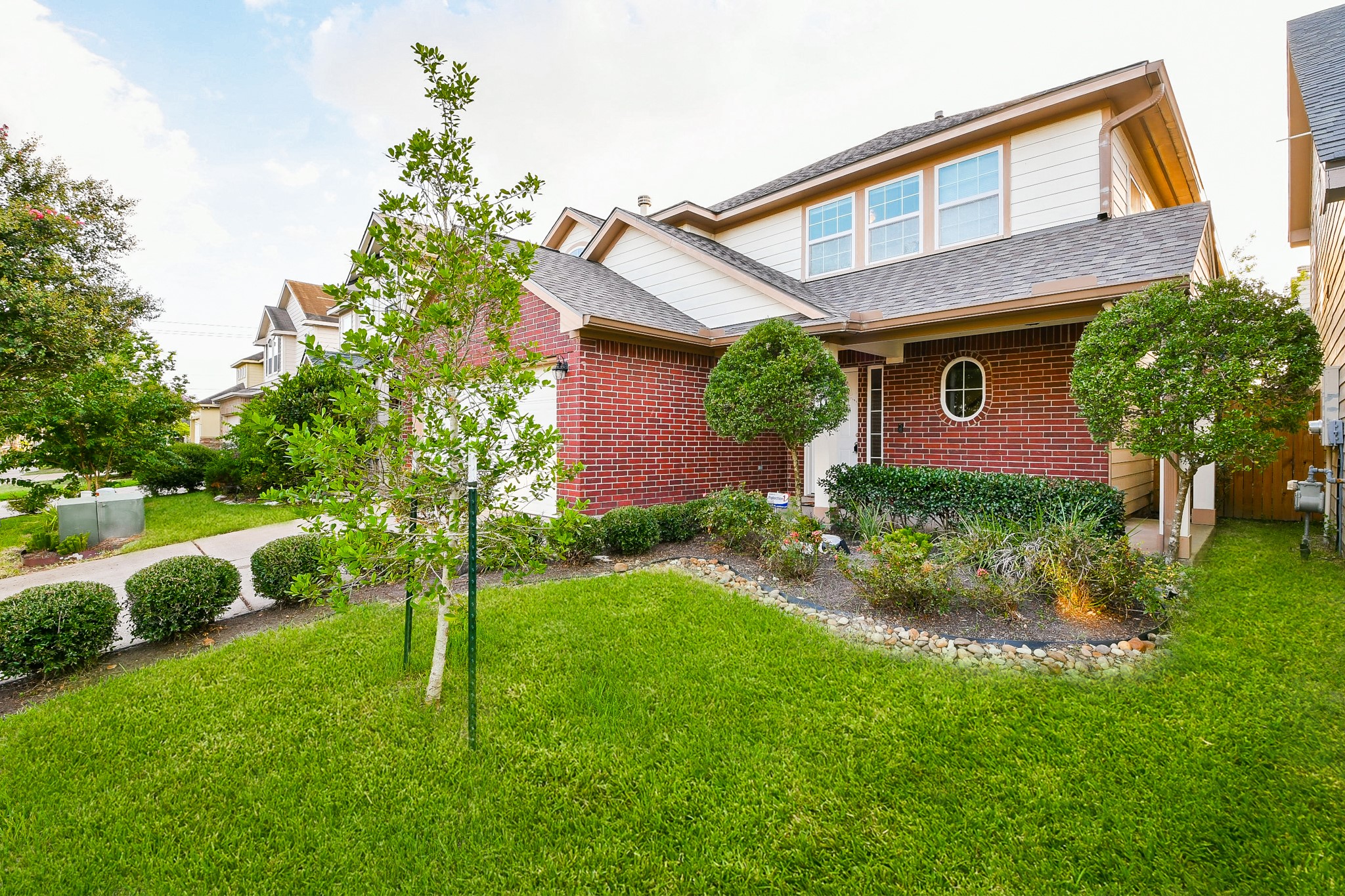 2415 Lacyberry Street Houston, TX 77080 - Photo 3 of 36 a front view of house with yard and green space