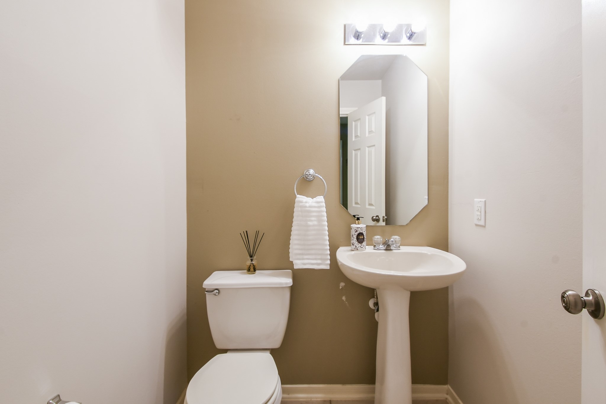 2415 Lacyberry Street Houston, TX 77080 - Photo 32 of 36 a bathroom with a toilet sink and mirror