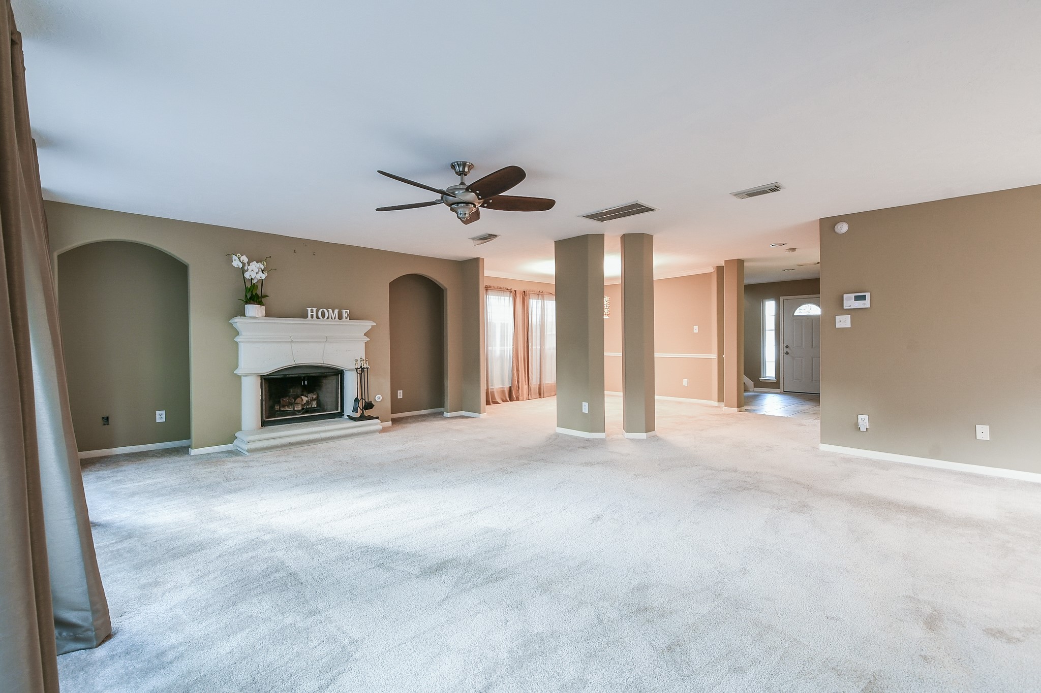 2415 Lacyberry Street Houston, TX 77080 - Photo 10 of 36 a view of an empty room with a fireplace