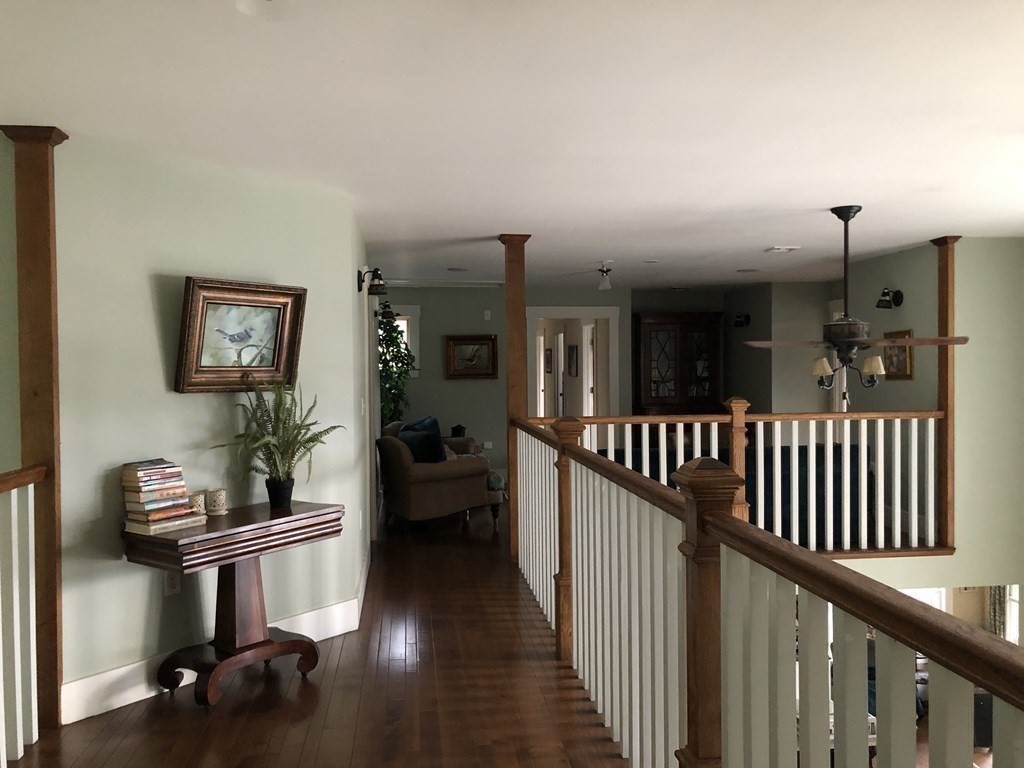 12 Estabrook Park Road Westminster, MA 01473 - Photo 11 of 29 a view of a hallway to livingroom with furniture and hardwood floor