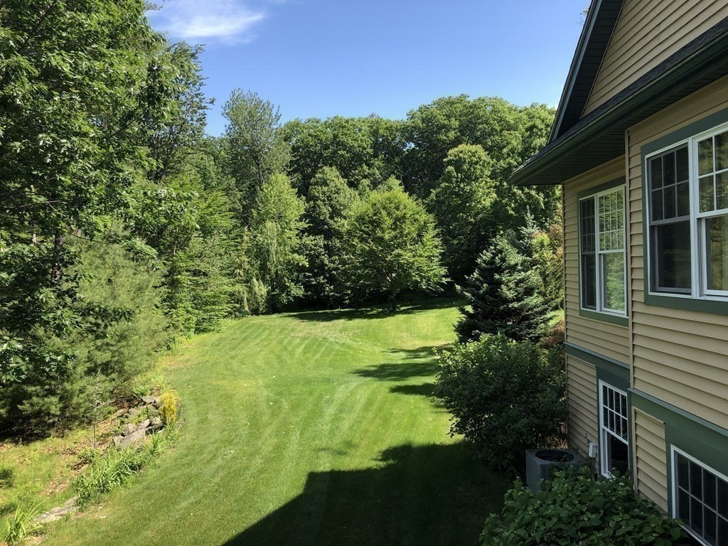 12 Estabrook Park Road Westminster, MA 01473 - Photo 5 of 29 a view of a yard with plants