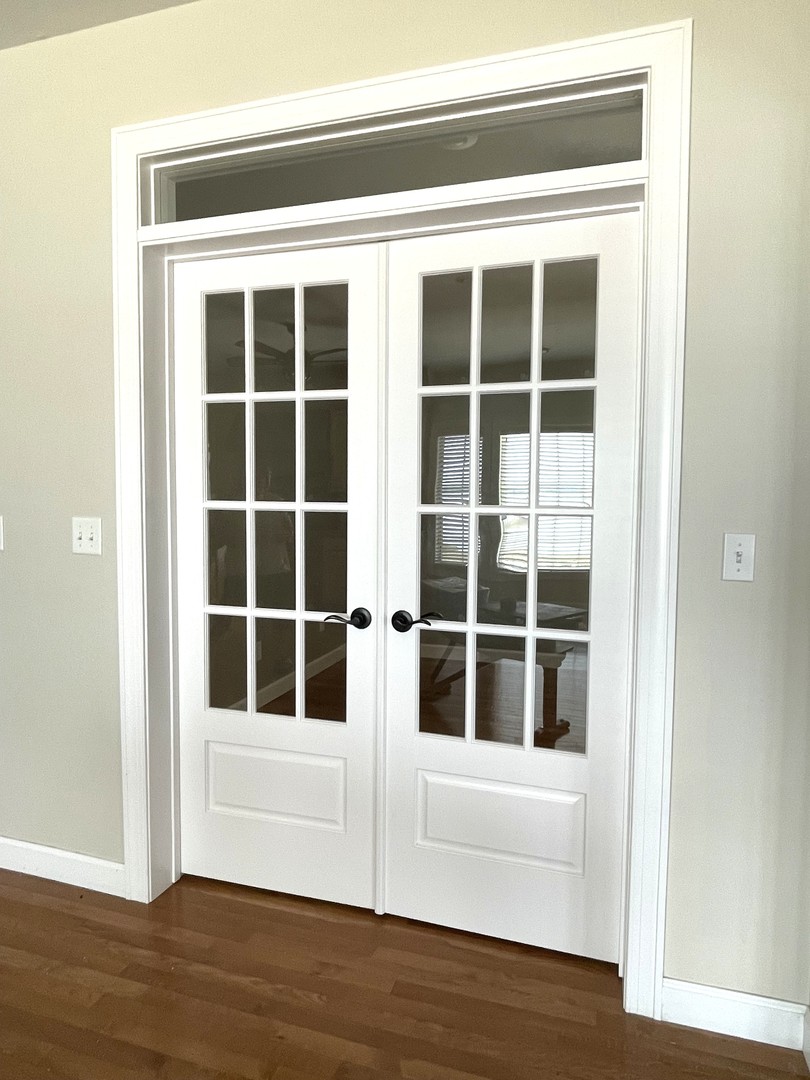 2239 Riverview Road Rock Falls, IL 61071 - Photo 13 of 70 a view of empty room with wooden floor and windows