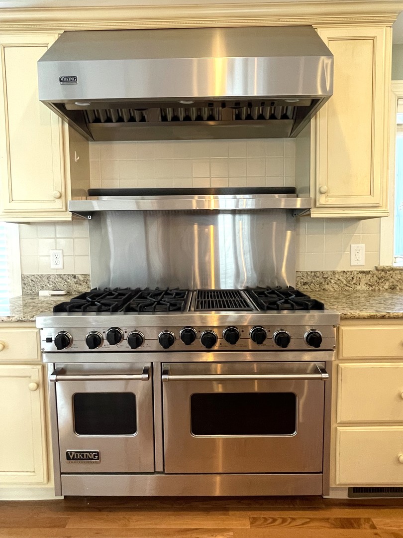 2239 Riverview Road Rock Falls, IL 61071 - Photo 25 of 70 a stove top oven sitting inside of a kitchen