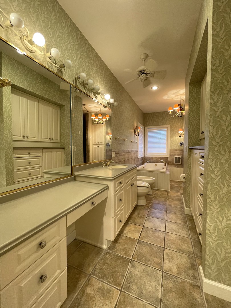 2239 Riverview Road Rock Falls, IL 61071 - Photo 32 of 70 a large white kitchen with a large window