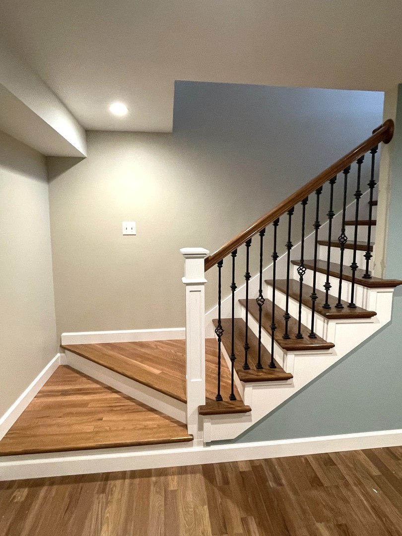 2239 Riverview Road Rock Falls, IL 61071 - Photo 39 of 70 a view of a room with wooden floor and stairs