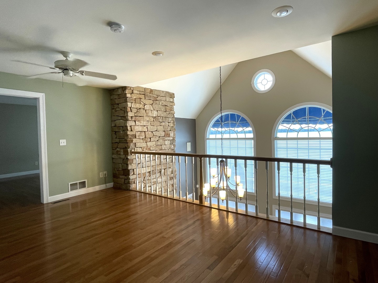 2239 Riverview Road Rock Falls, IL 61071 - Photo 40 of 70 wooden floor in an empty room with windows and wooden floor