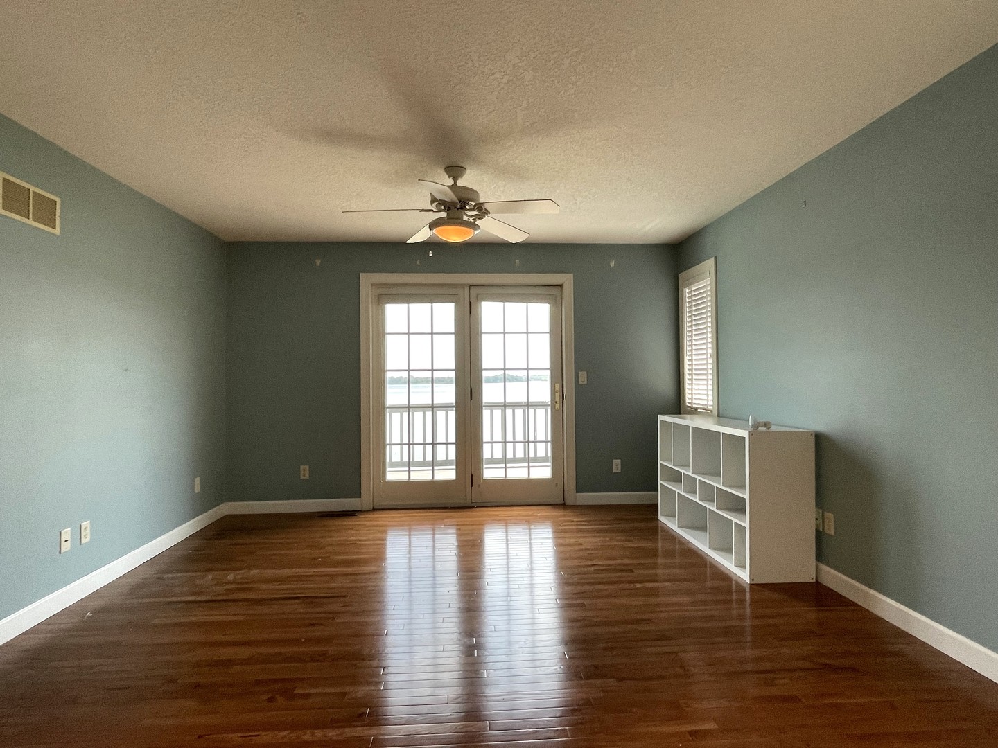 2239 Riverview Road Rock Falls, IL 61071 - Photo 41 of 70 a view of an empty room with wooden floor and a window