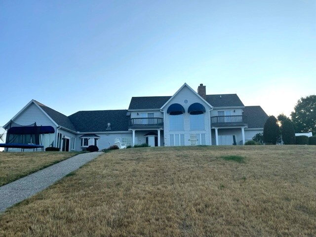 2239 Riverview Road Rock Falls, IL 61071 - Photo 70 of 70 a front view of a house with a yard