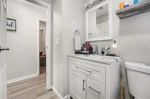 a kitchen with a sink and a washer dryer