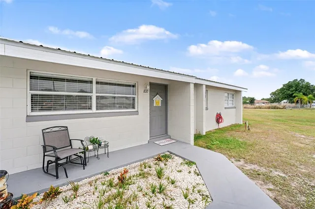 a front view of a house with patio