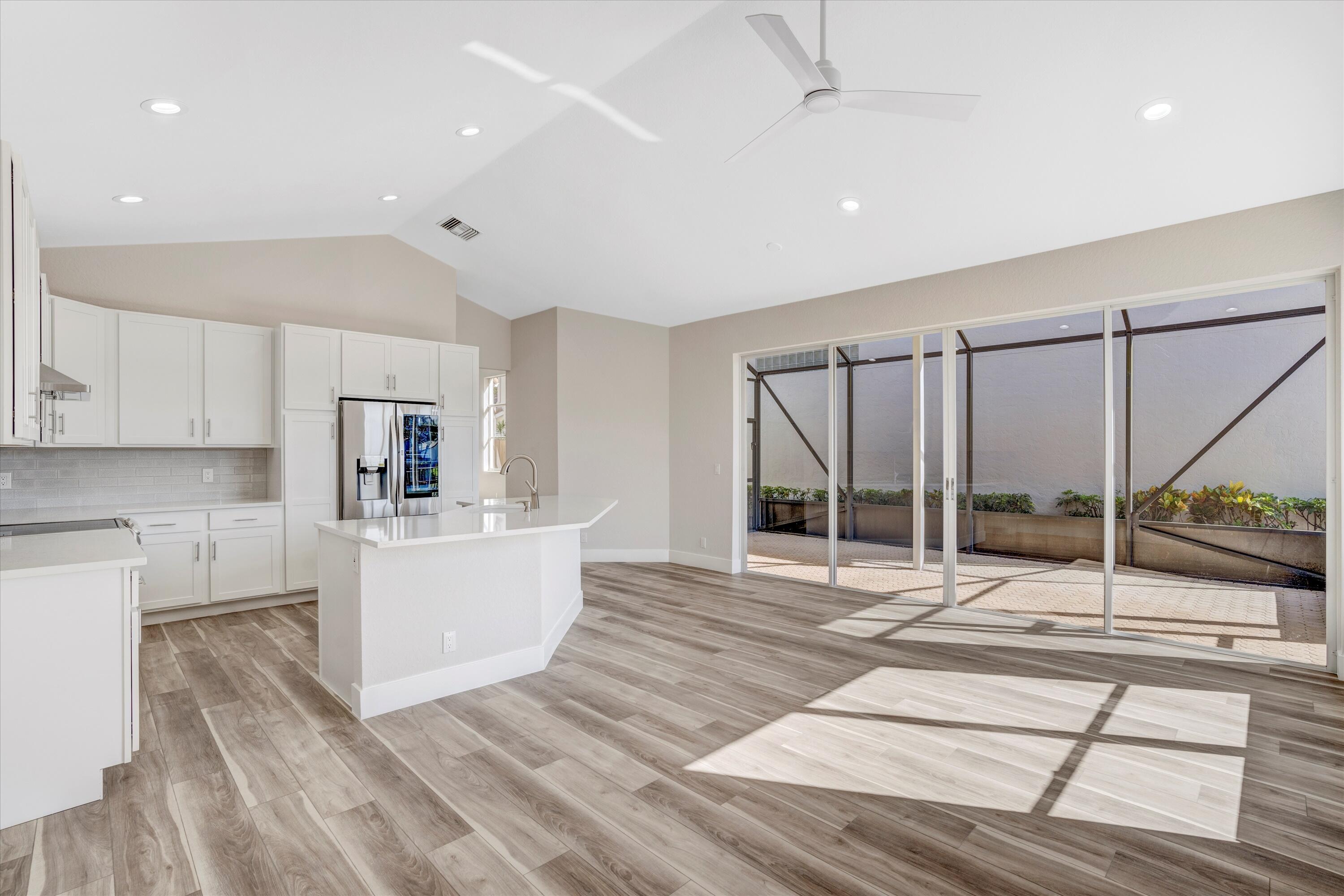 2482 Northwest 67th Street Boca Raton, FL 33496 - Photo 6 of 25 Family Room / Kitchen
