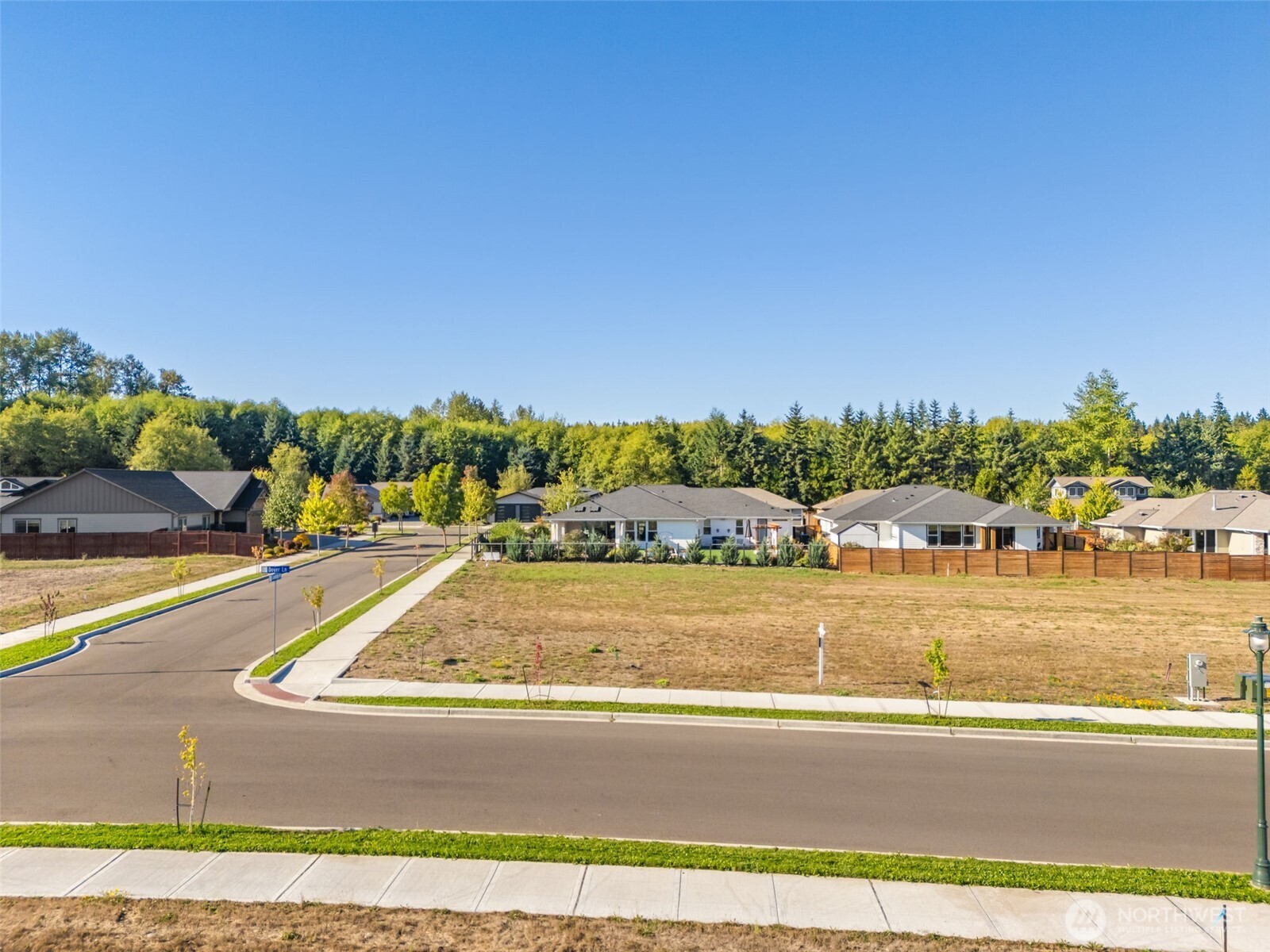 80 Cambridge Terrace Sequim, WA 98382 - Photo 4 of 24 a view of a swimming pool with an ocean view