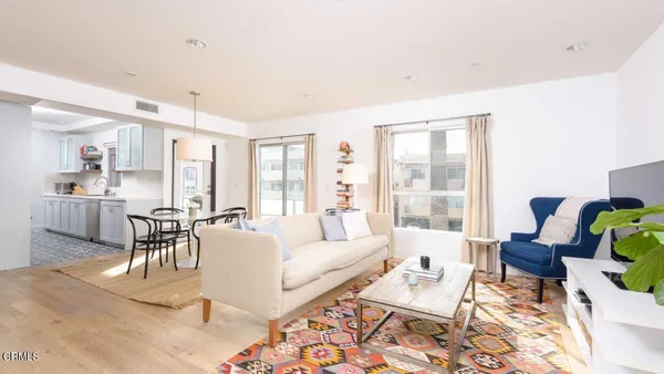 a living room with furniture and a table