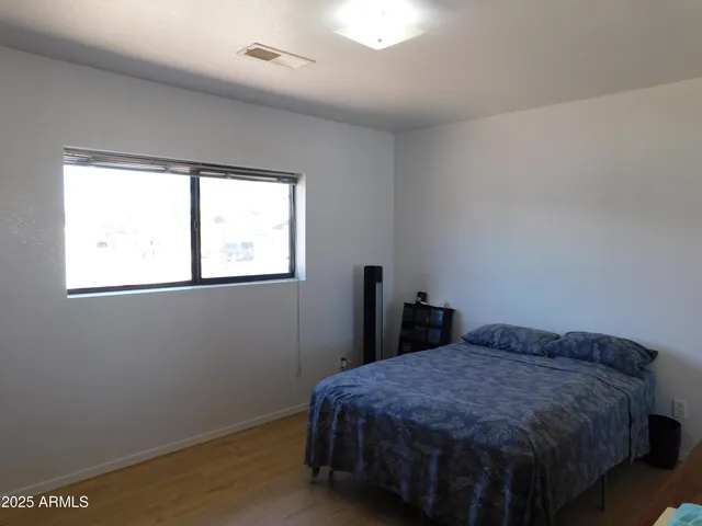 a bathroom with a sink toilet and mirror