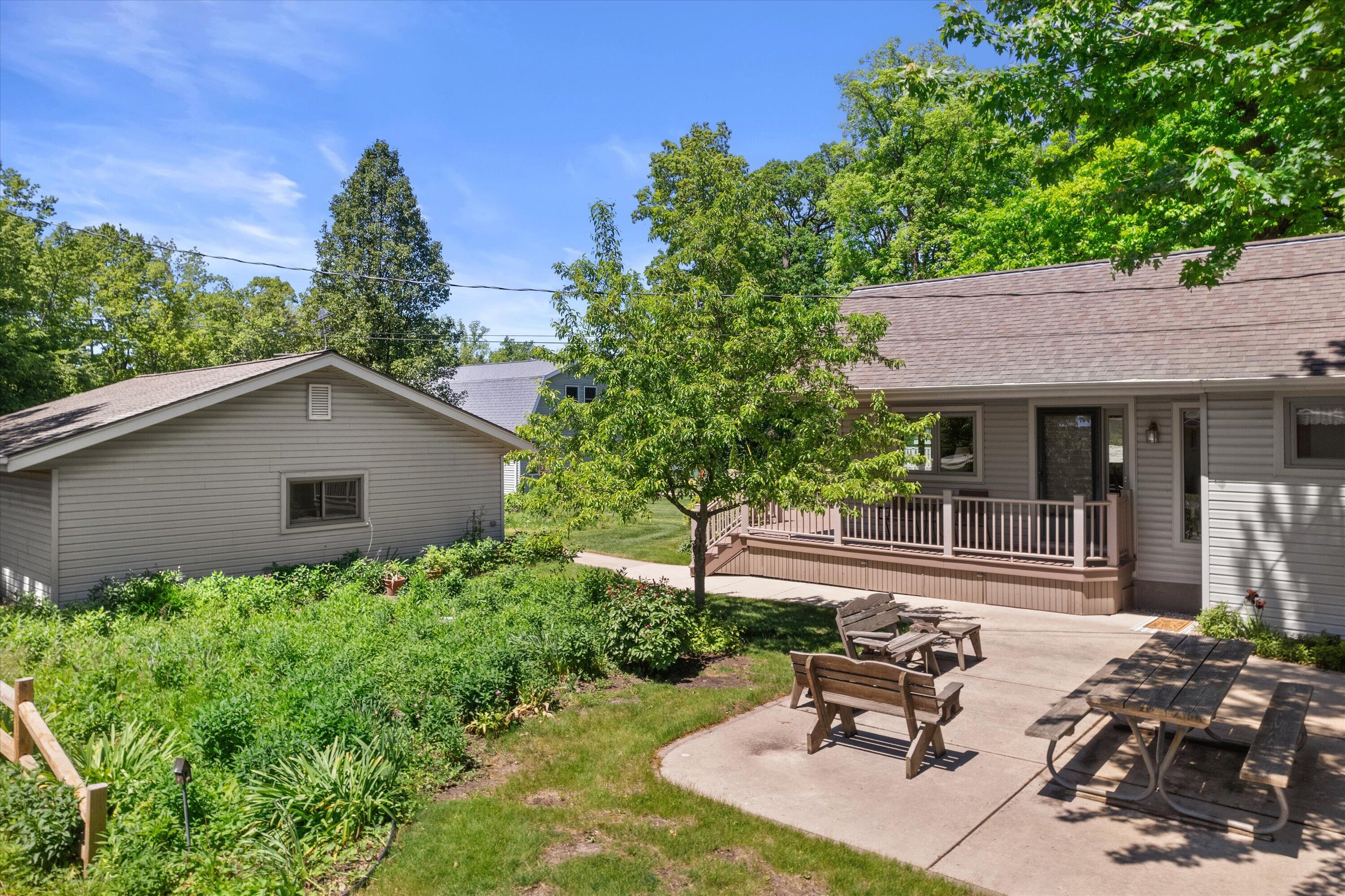 7301 West Wind Lake Road Norway, WI 53185 - Photo 52 of 58 Side Patio and Gardens
