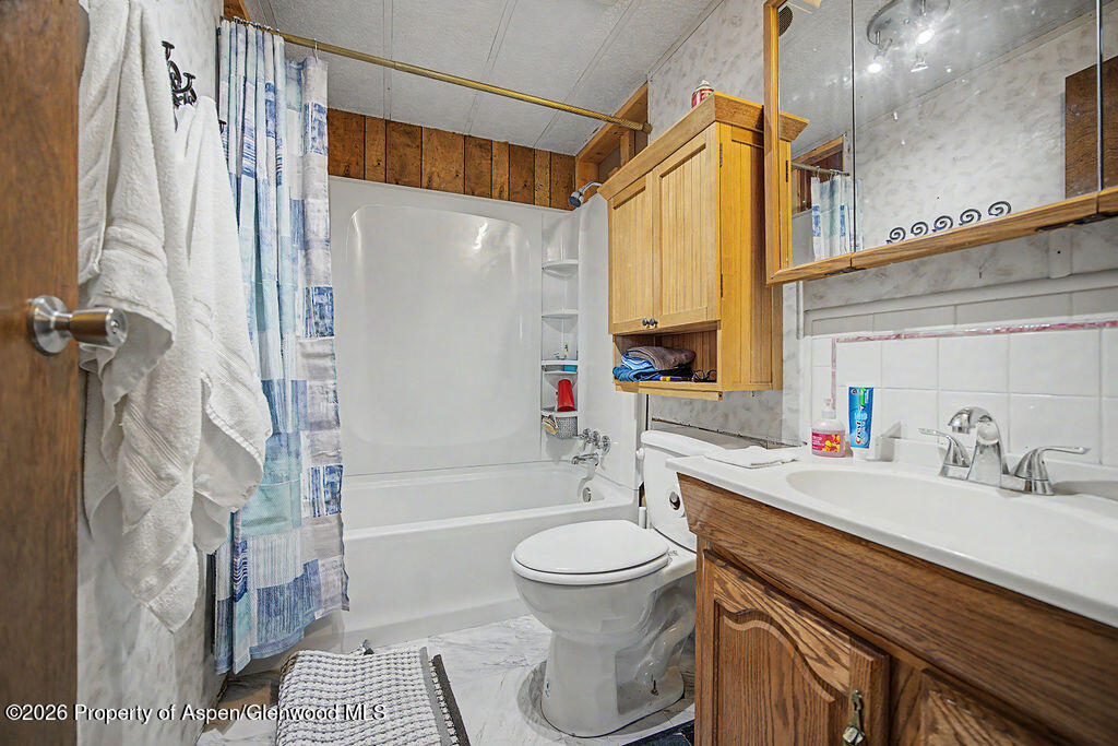723 Barbara Drive Craig, CO 81625 - Photo 41 of 48 a bathroom with a sink a toilet and a bathtub