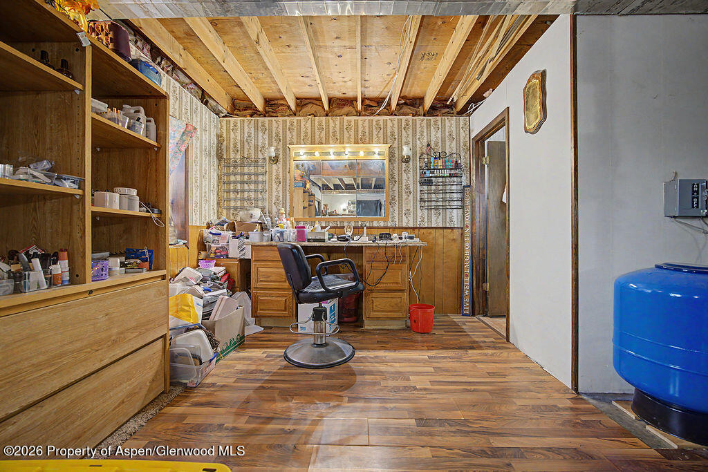 723 Barbara Drive Craig, CO 81625 - Photo 46 of 48 a view of a dining room with furniture a chandelier and wooden floor