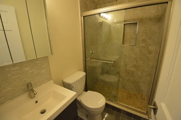 a bathroom with a sink and a toilet