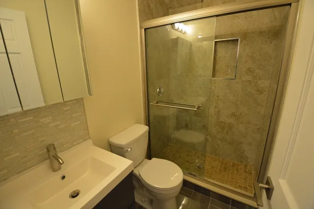 a bathroom with a sink and a toilet