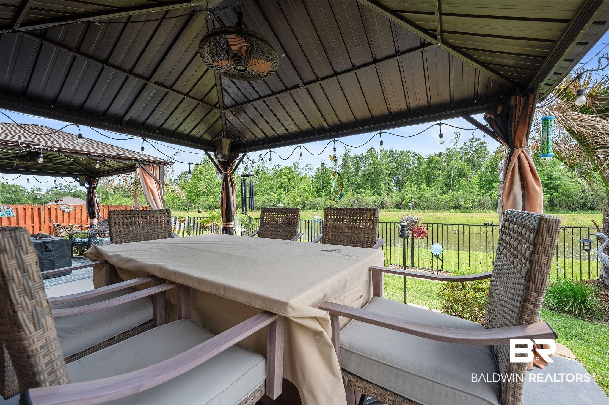 1165 Stella Road Foley, AL 36535 - Photo 38 of 42 View of patio / terrace featuring a gazebo and outdoor dining space