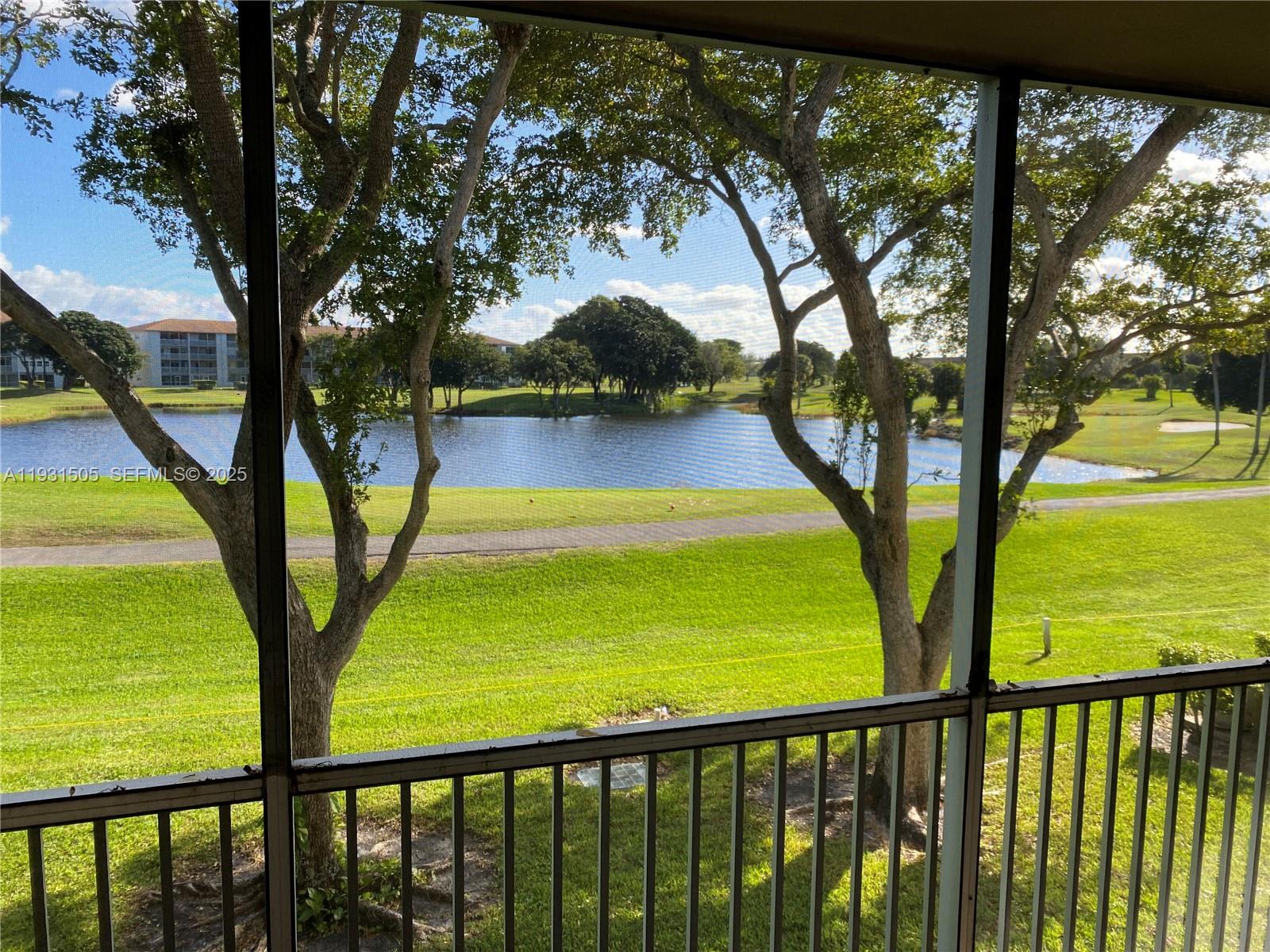 a view of swimming pool from a balcony
