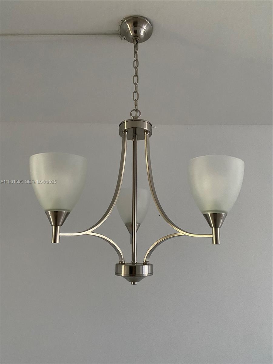 301 Southwest 135th Avenue, Unit 209C Pembroke Pines, FL 33027 - Photo 13 of 14 a view of a room with gym equipment