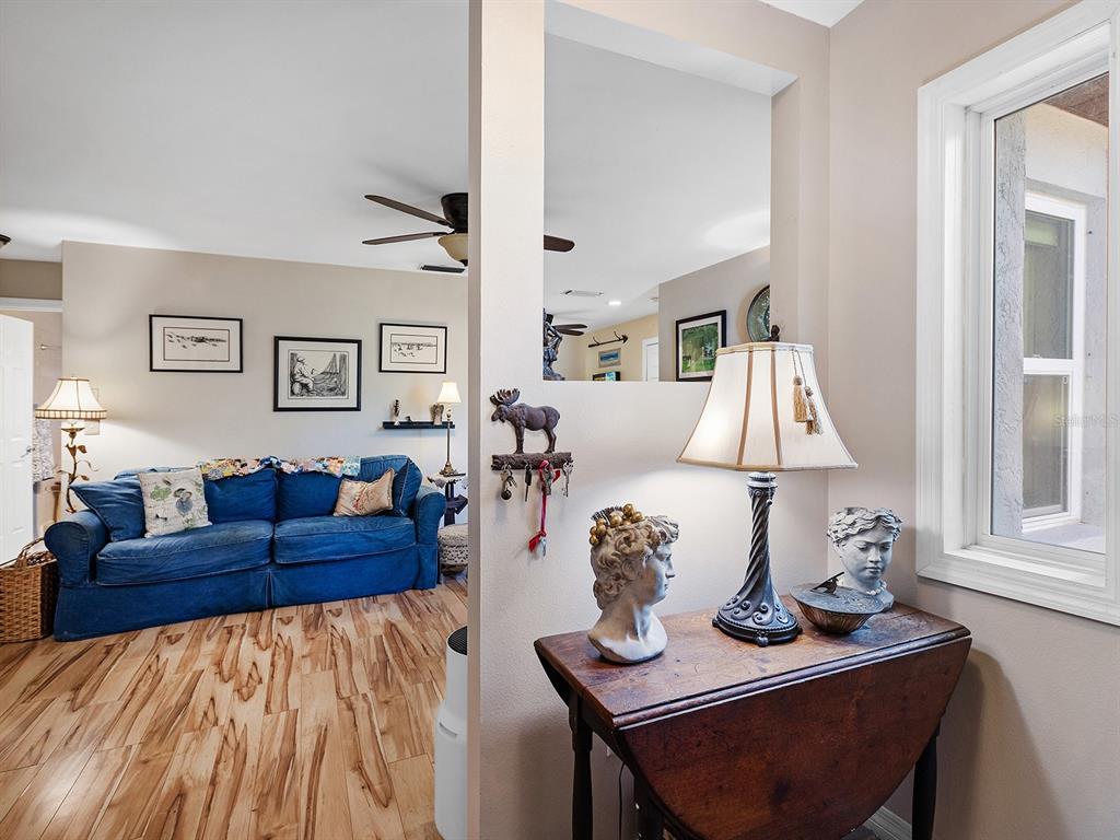 3932 Ragen Street North Port, FL 34287 - Photo 12 of 40 a living room with furniture and a table