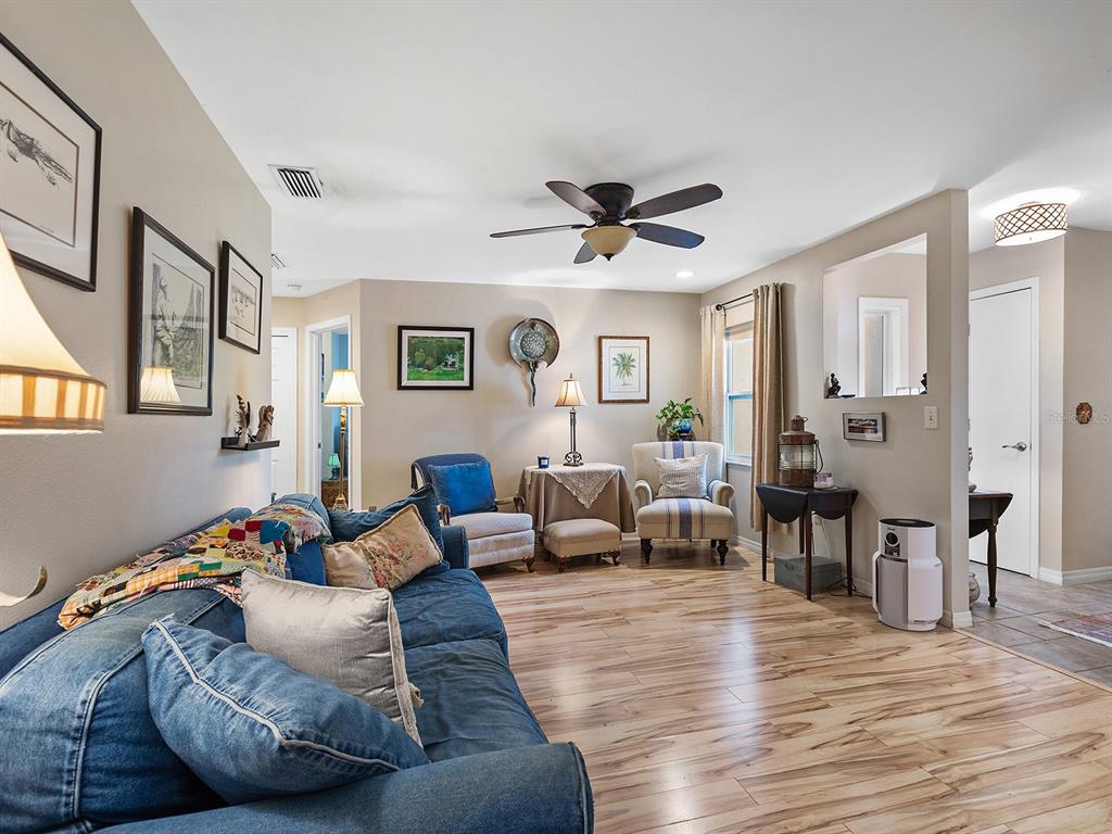 3932 Ragen Street North Port, FL 34287 - Photo 15 of 40 a living room with furniture and wooden floor