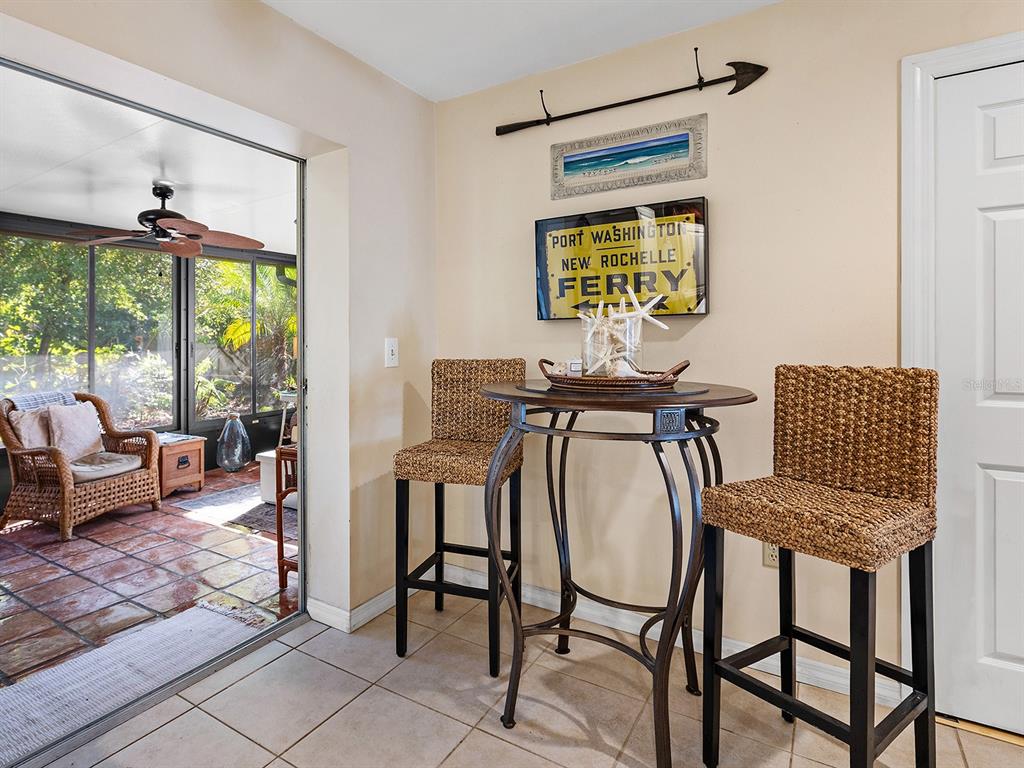 3932 Ragen Street North Port, FL 34287 - Photo 19 of 40 a view of a dining room with furniture window and outside view