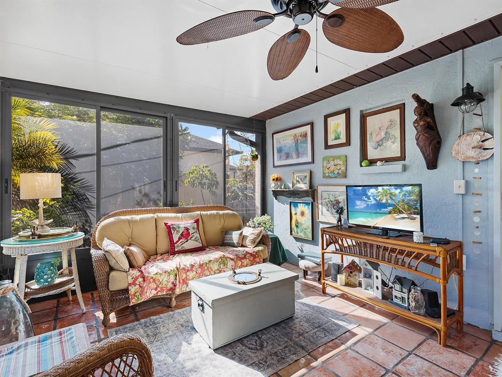 3932 Ragen Street North Port, FL 34287 - Photo 21 of 40 a living room with furniture and a large window