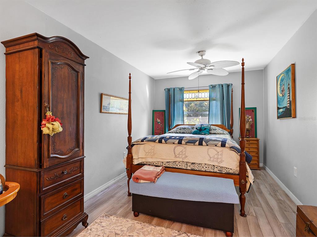 3932 Ragen Street North Port, FL 34287 - Photo 25 of 40 a bed sitting in a bedroom next to a window